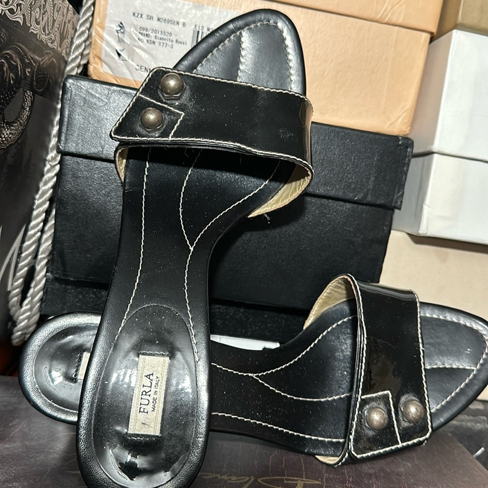 Black Furla slides gently used.
